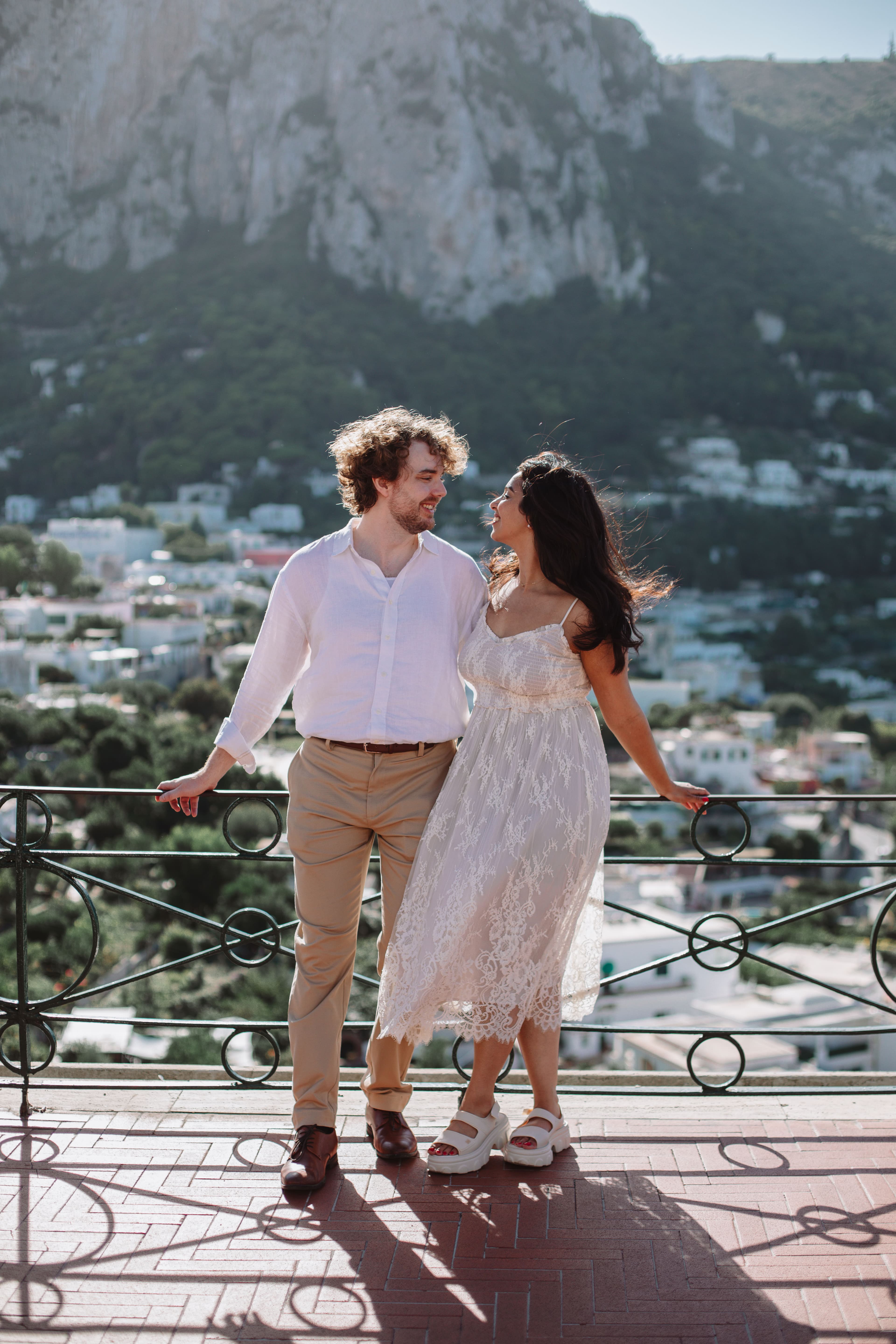 Ben and Saba walking along a terrace in Capri
